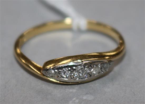 An 18ct gold and five stone diamond ring, size K.